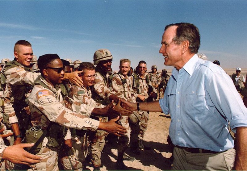 President Bush visiting American troops in Saudi Arabia on Thanksgiving Day, 1990 (public domain)   